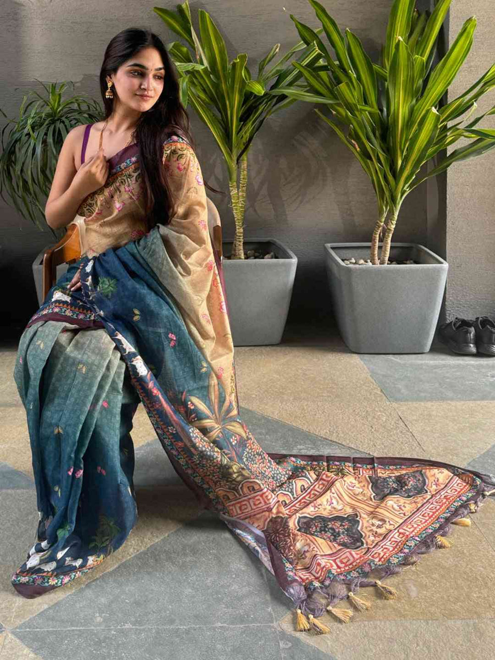 Model showcasing Turquoise Ombre Pichwai Saree.