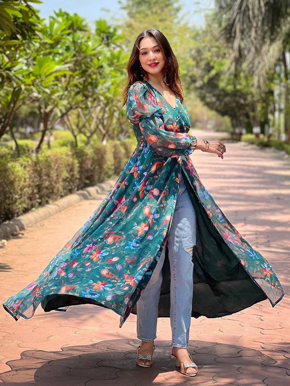 Floral dark green angarakha dress with jeans outdoors