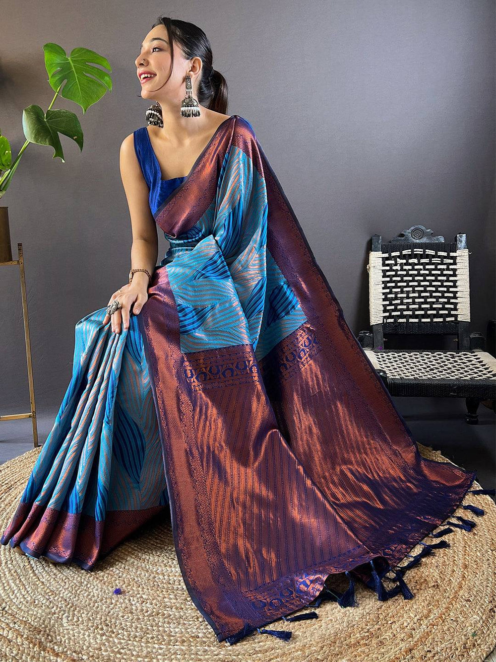Seated Model in Royal Blue Tussar Silk Ikkat Saree