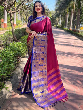 Elegant maroon saree with gold and blue detailing