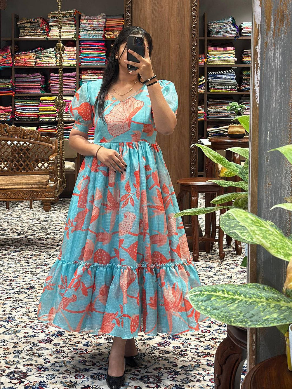 Elegant Sea Blue Floral Print Dress on display