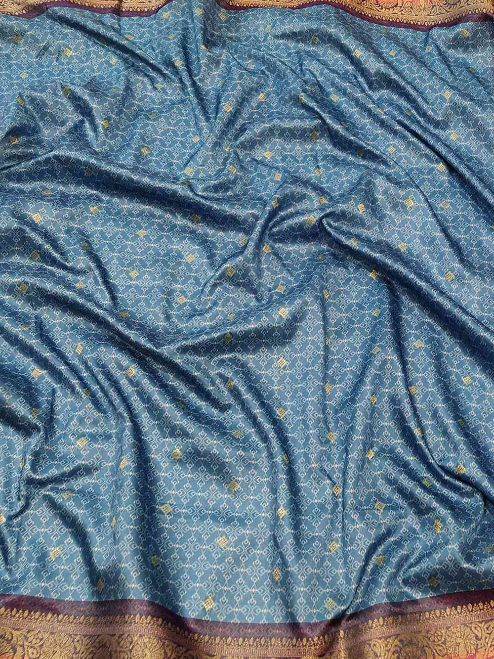 Luxurious blue Banarasi silk fabric with gold Jeqard weaving