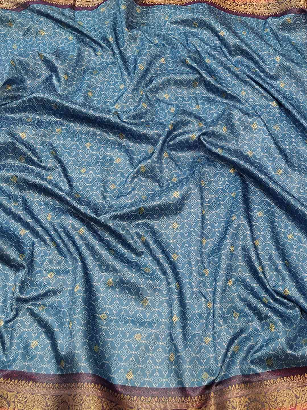 Luxurious blue Banarasi silk fabric with gold Jeqard weaving
