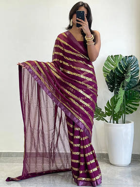 Georgette saree with striped sequins work and solid border