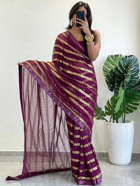 Georgette saree with striped sequins work and solid border
