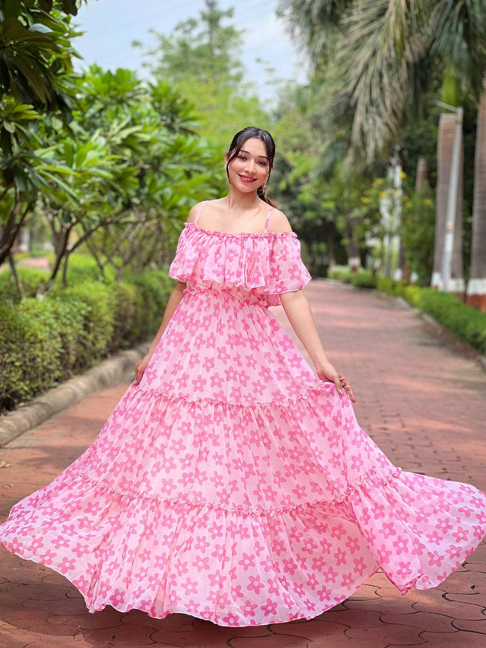 Off-shoulder pink floral dress with flowing design