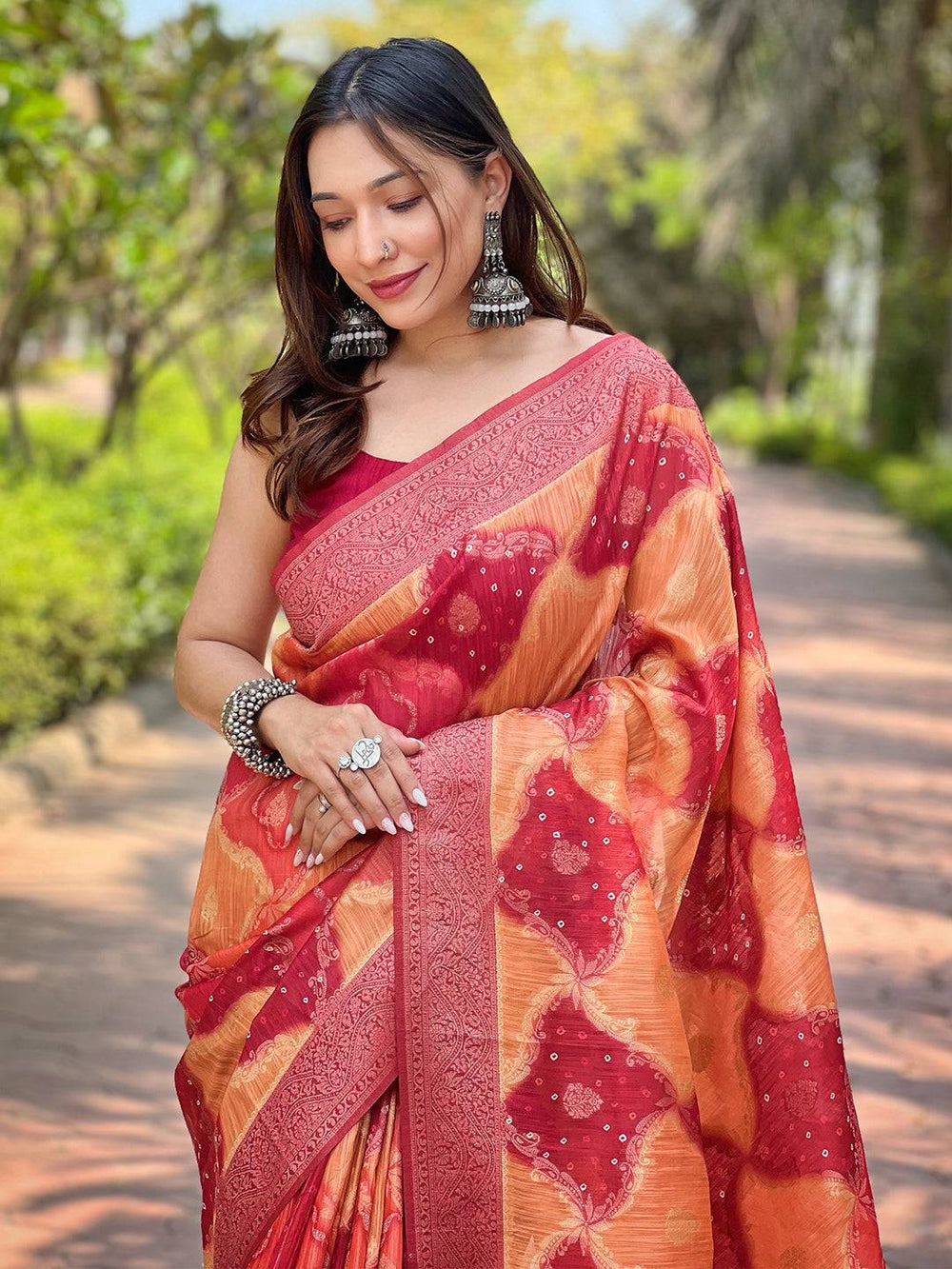 Stylish Orange Digital Block Print Saree with intricate details