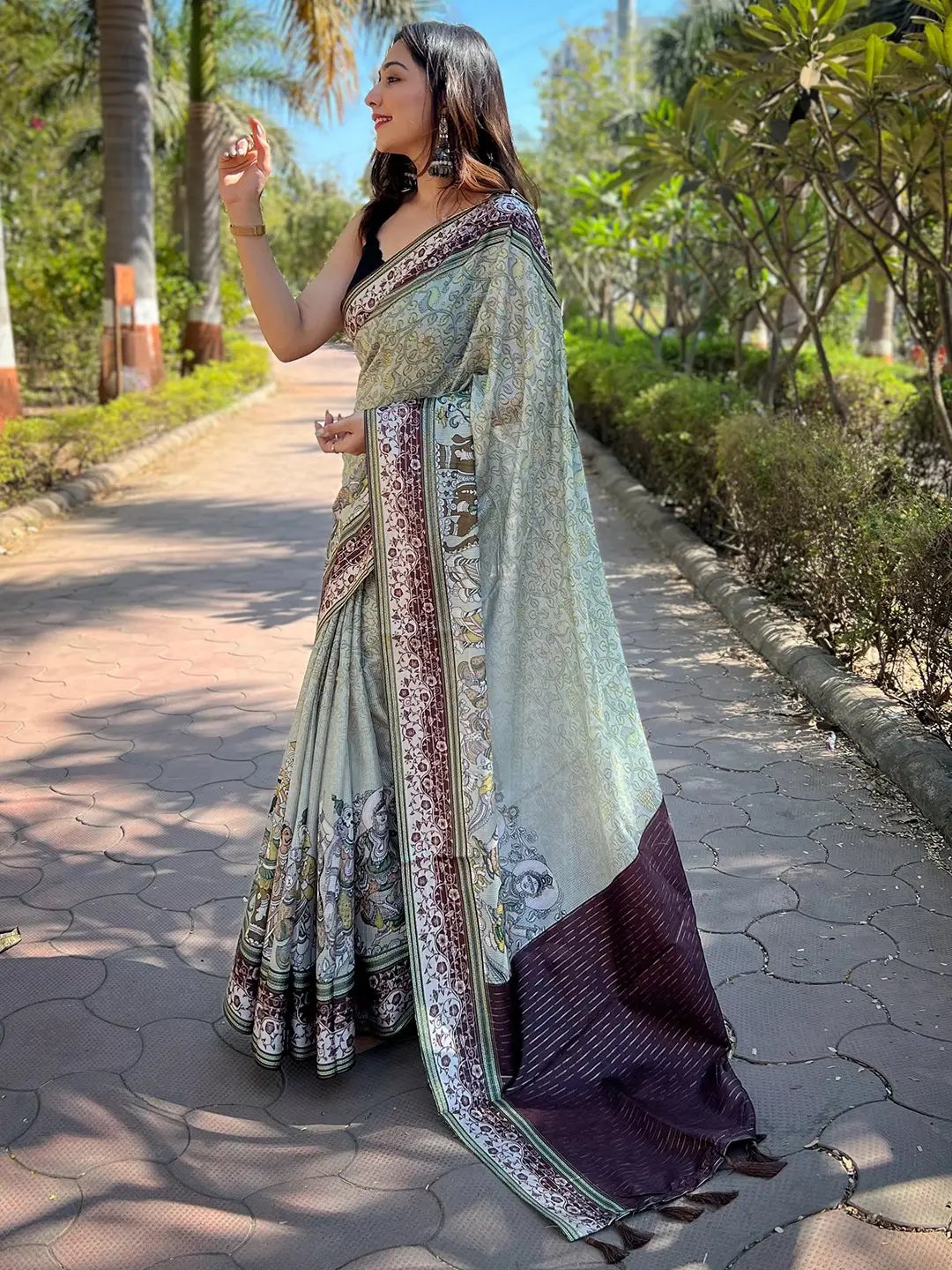 Side view of Pista Satin Kota Doria Saree with Kalamkari print