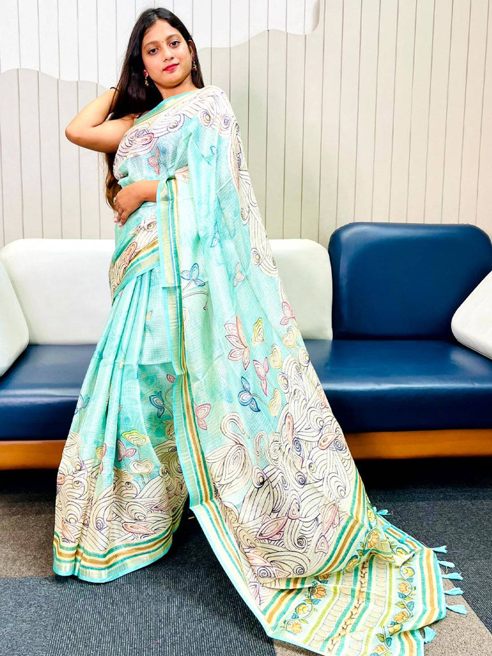 Elegant floral Kalamkari print on turquoise Kota Doriya saree