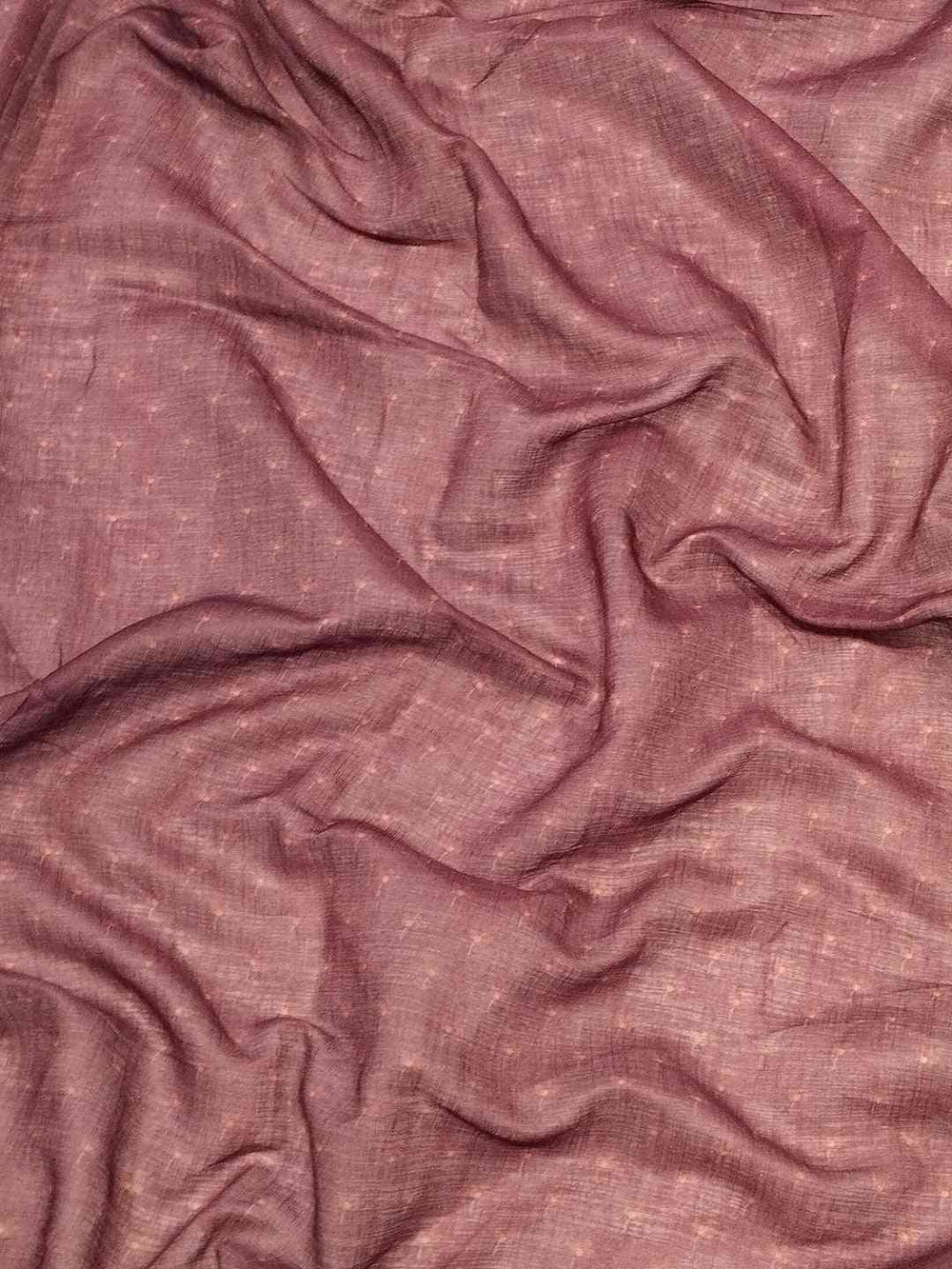 Close-up of maroon fabric texture