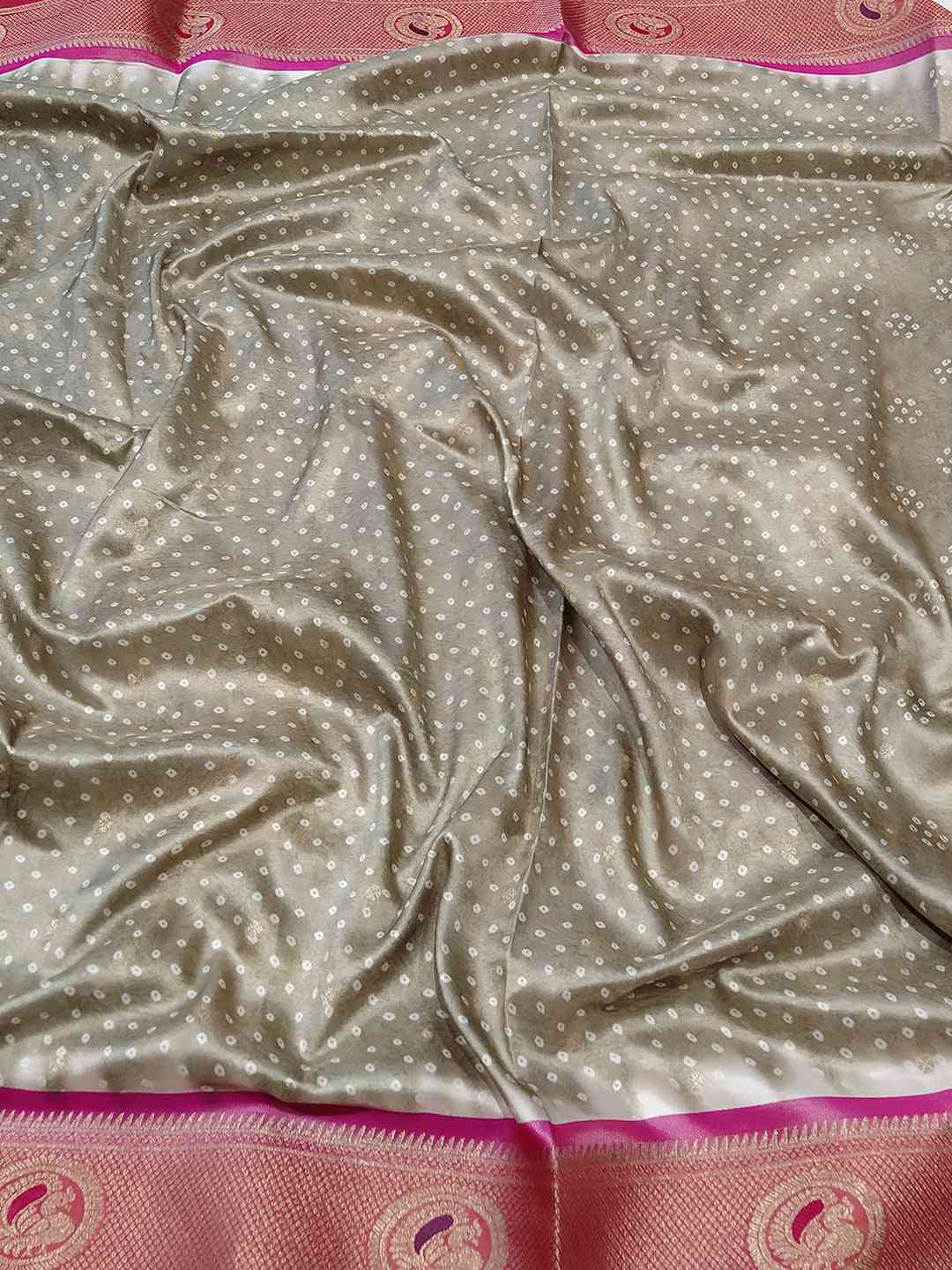 Close-up of Paithani Bandhej saree fabric with Minakari pallu
