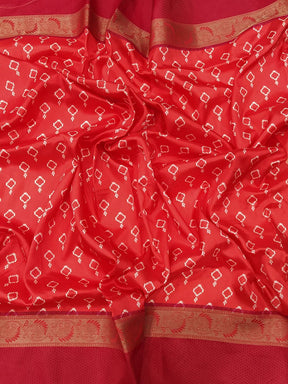 Detailed view of red Gadwal border with intricate patterns.