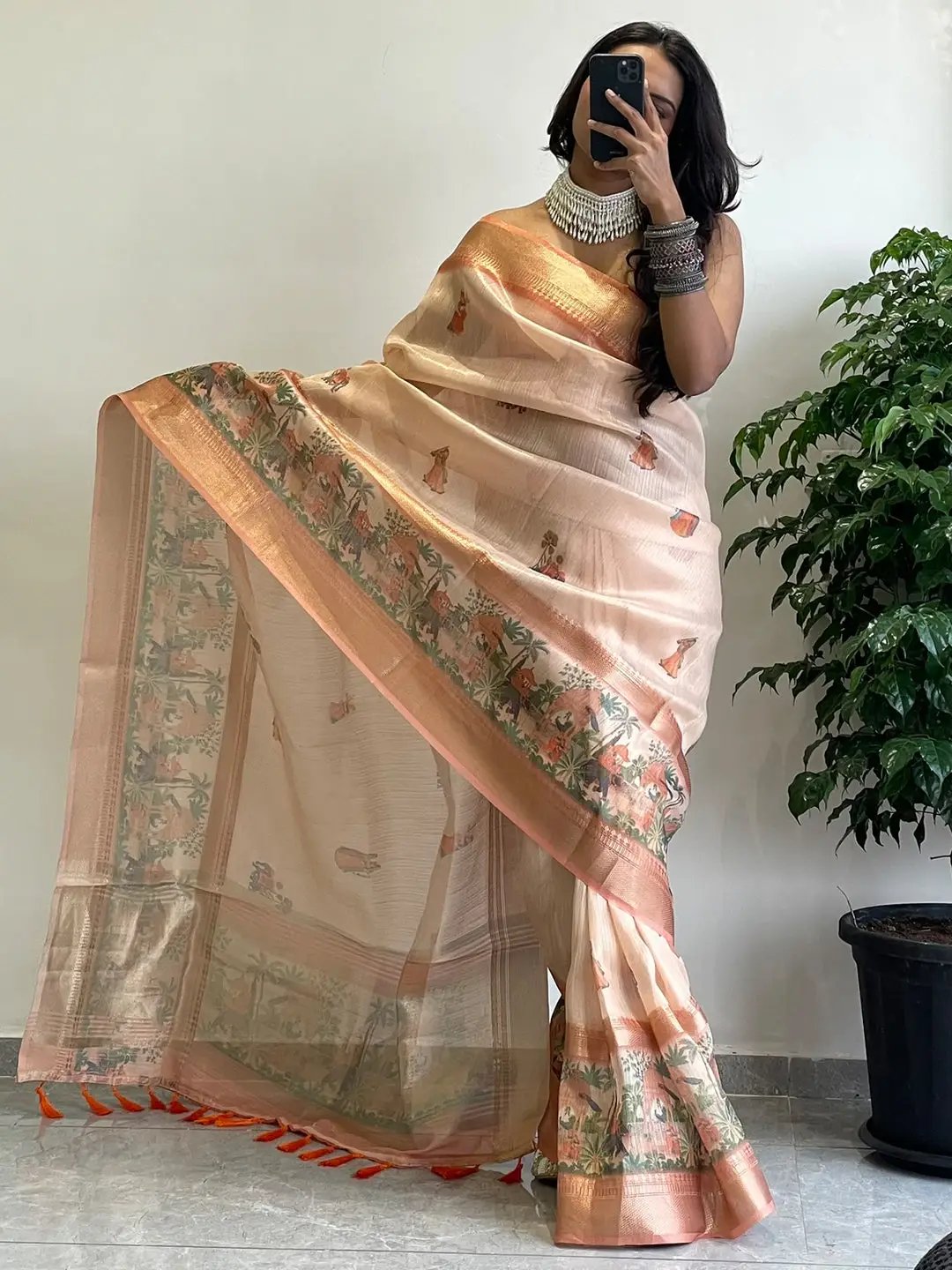 Soft Gold Zari Tissue Saree with digital print, worn by model.