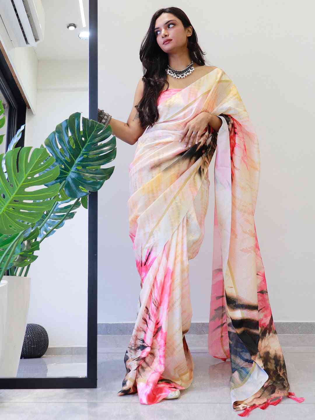 Multicolour tie dye digital printed saree draped elegantly