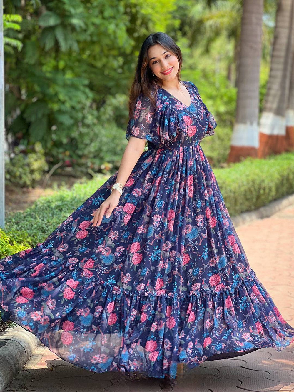 Woman twirling in Midnight Navy Floral V-Neck Dress