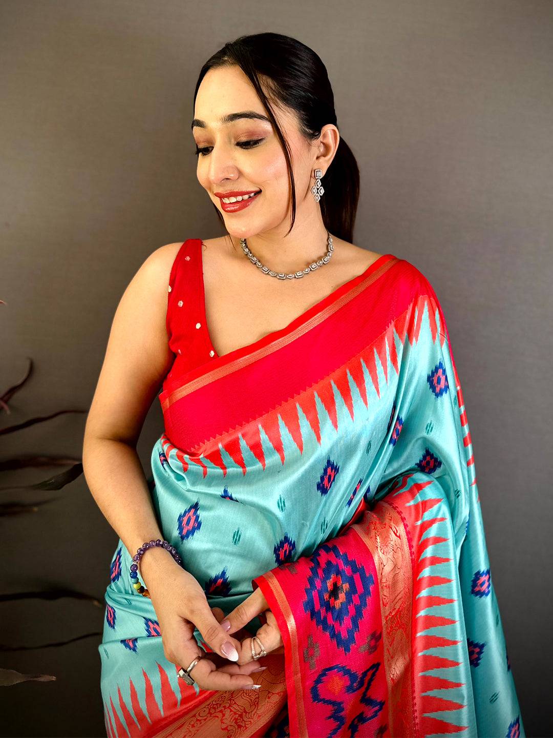 Turquoise Contrast Satin Ikat Zari Silk Saree