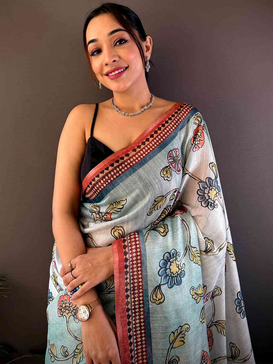 Sky Blue Zari Tussar Floral Saree with intricate floral prints and elegant zari detailing, perfect for festive and wedding occasions.