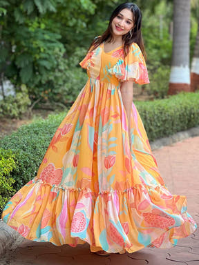 Flowing Carnival Yellow V-Neck Dress with abstract design