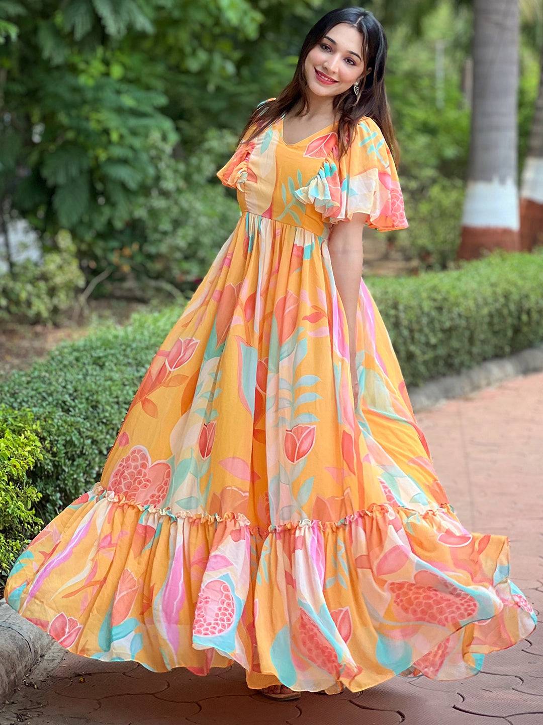 Flowing Carnival Yellow V-Neck Dress with abstract design