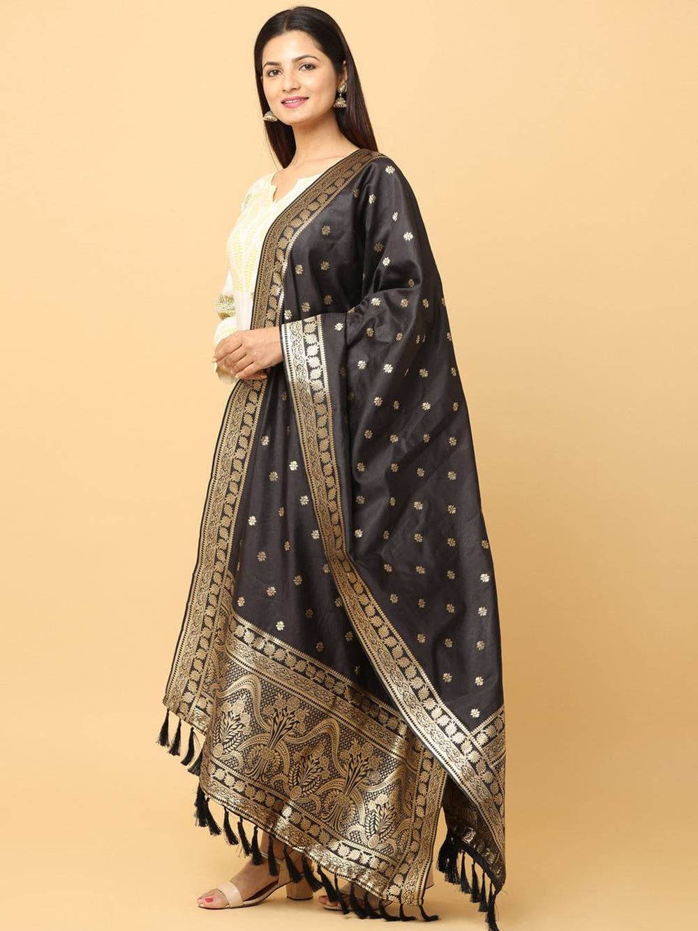 Side view of woven design silk blend black dupatta.