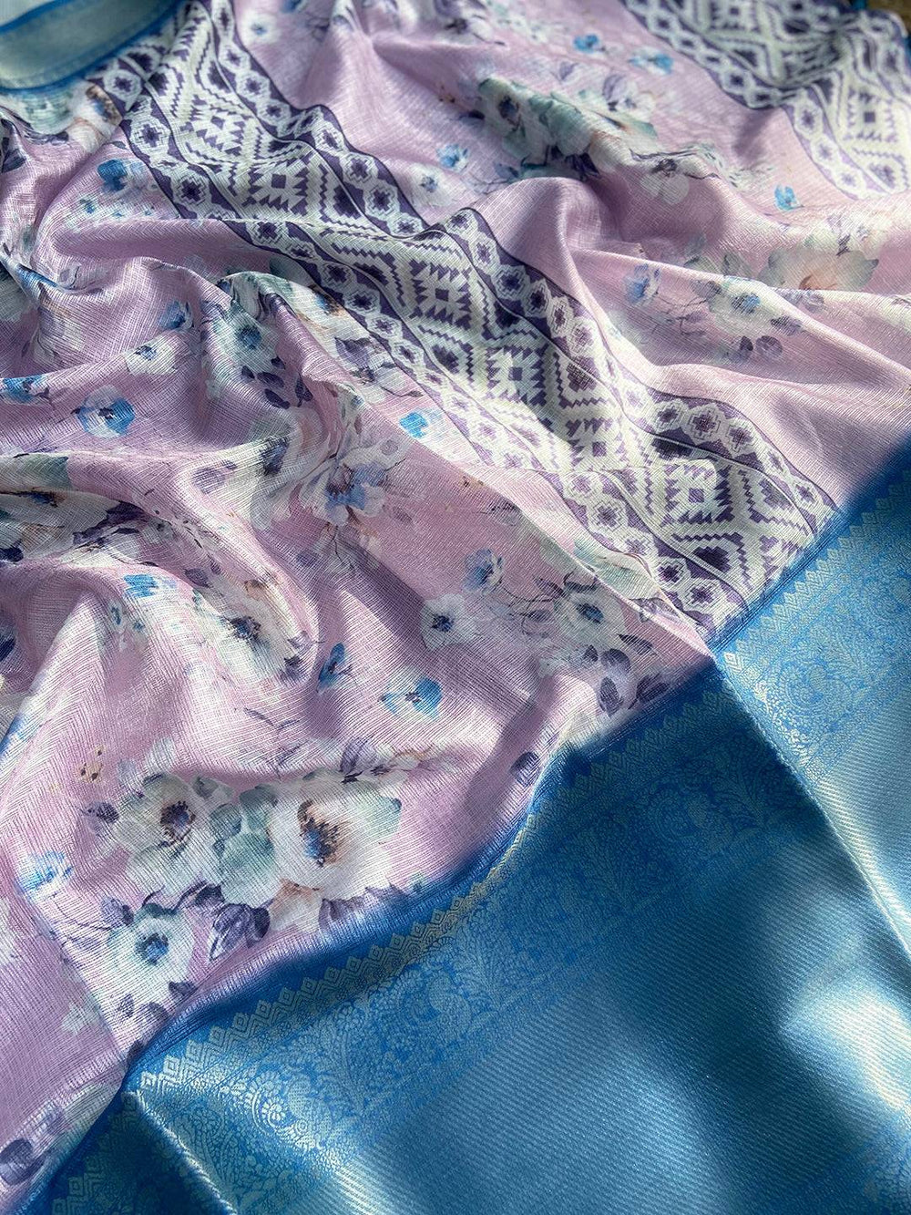 Detailed view of floral saree with blue zari border