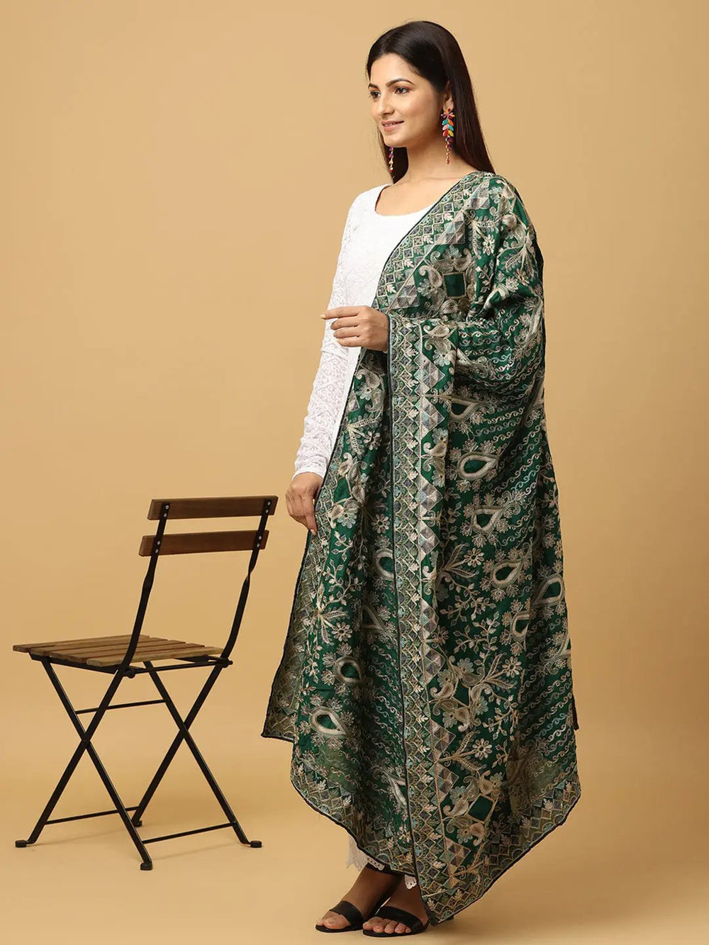 Side view of green poly chiffon pashmina dupatta with designs
