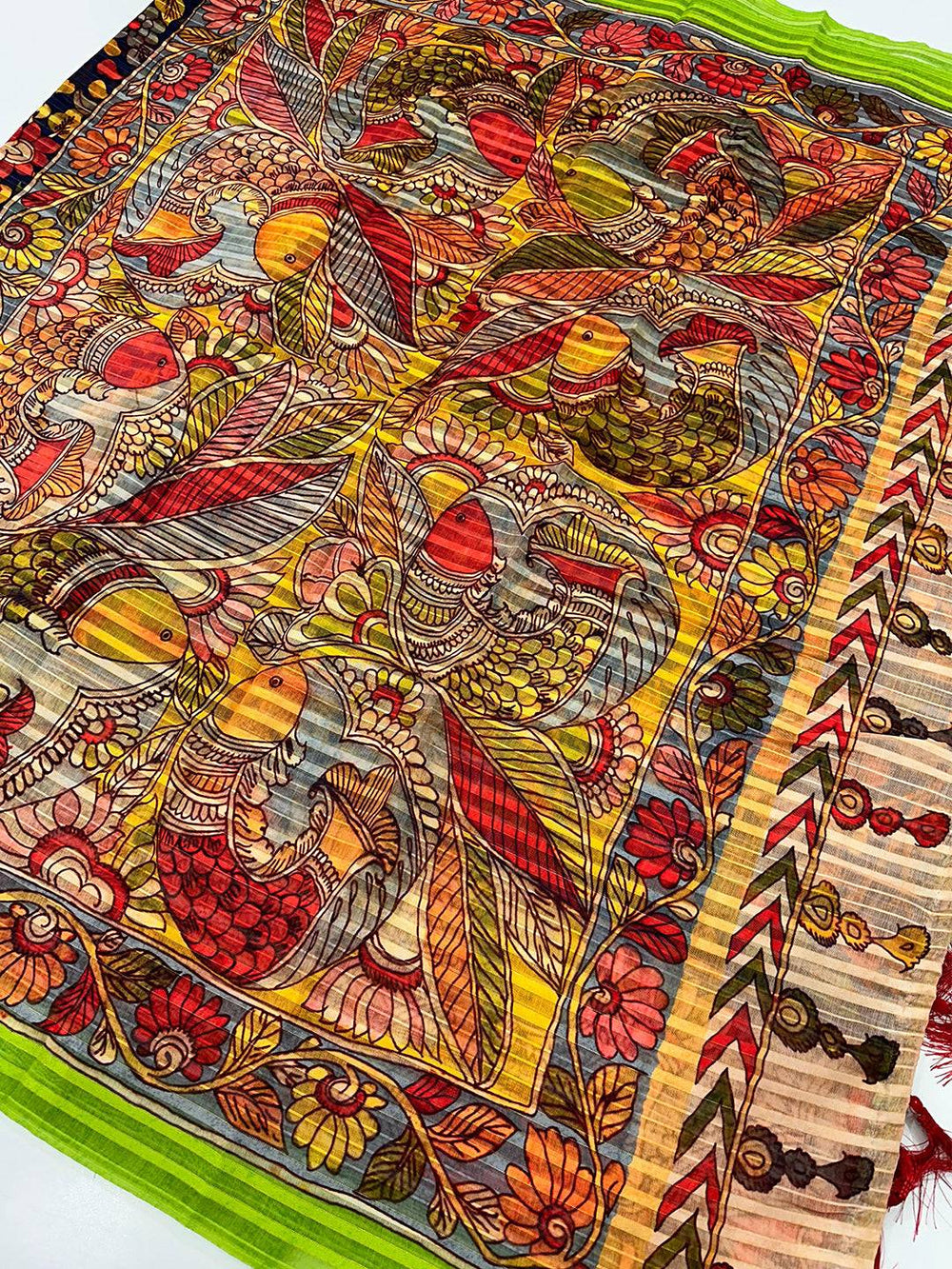 Vibrant patterns on Orchid Blue Pen Kalamkari Linen Saree fabric