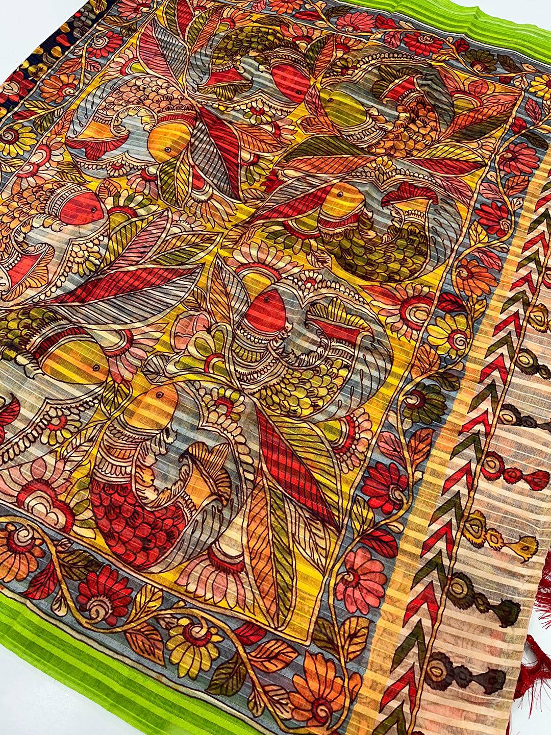 Vibrant patterns on Orchid Blue Pen Kalamkari Linen Saree fabric