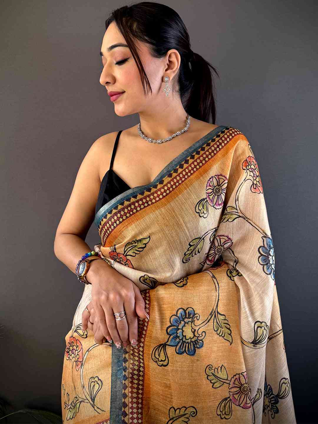 Radiant Orange Zari Tussar Floral Saree

