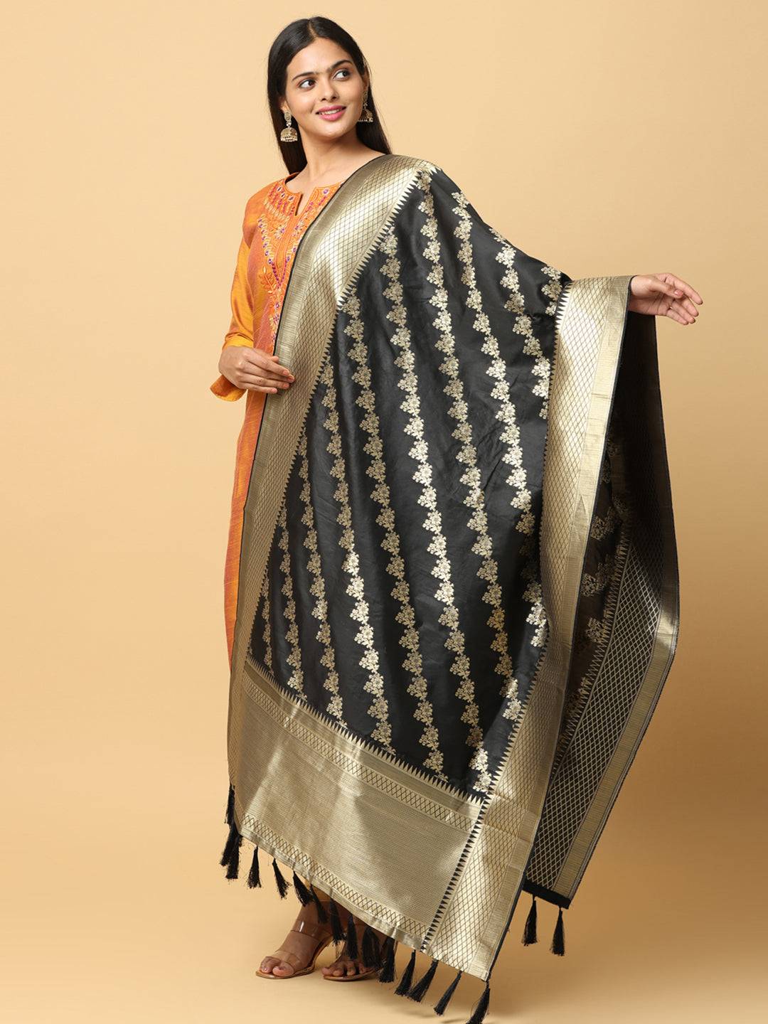 Black dupatta showcasing detailed woven motifs.