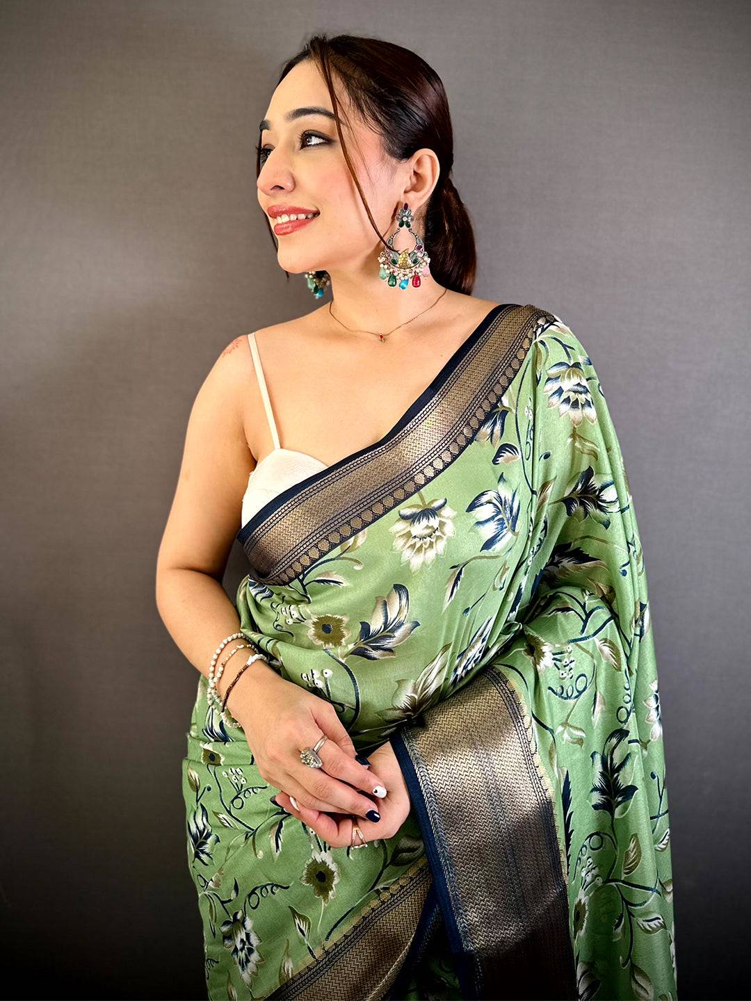 Pista Soft Dola Silk Floral Kanchi Border Saree