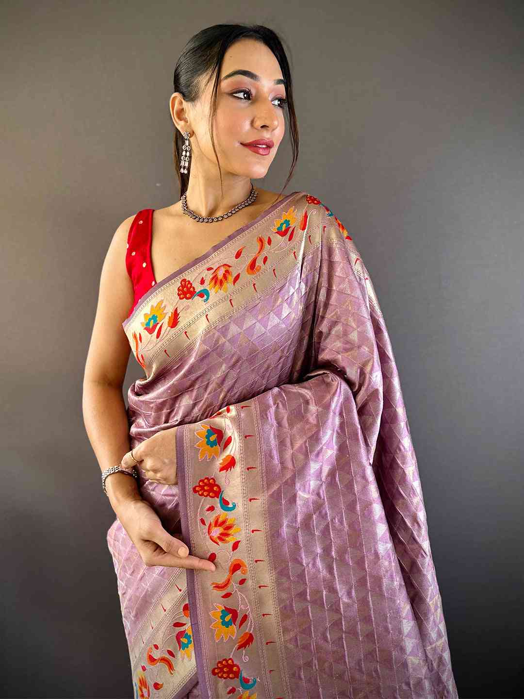 Light wine silk blend Paithani saree with floral zari work