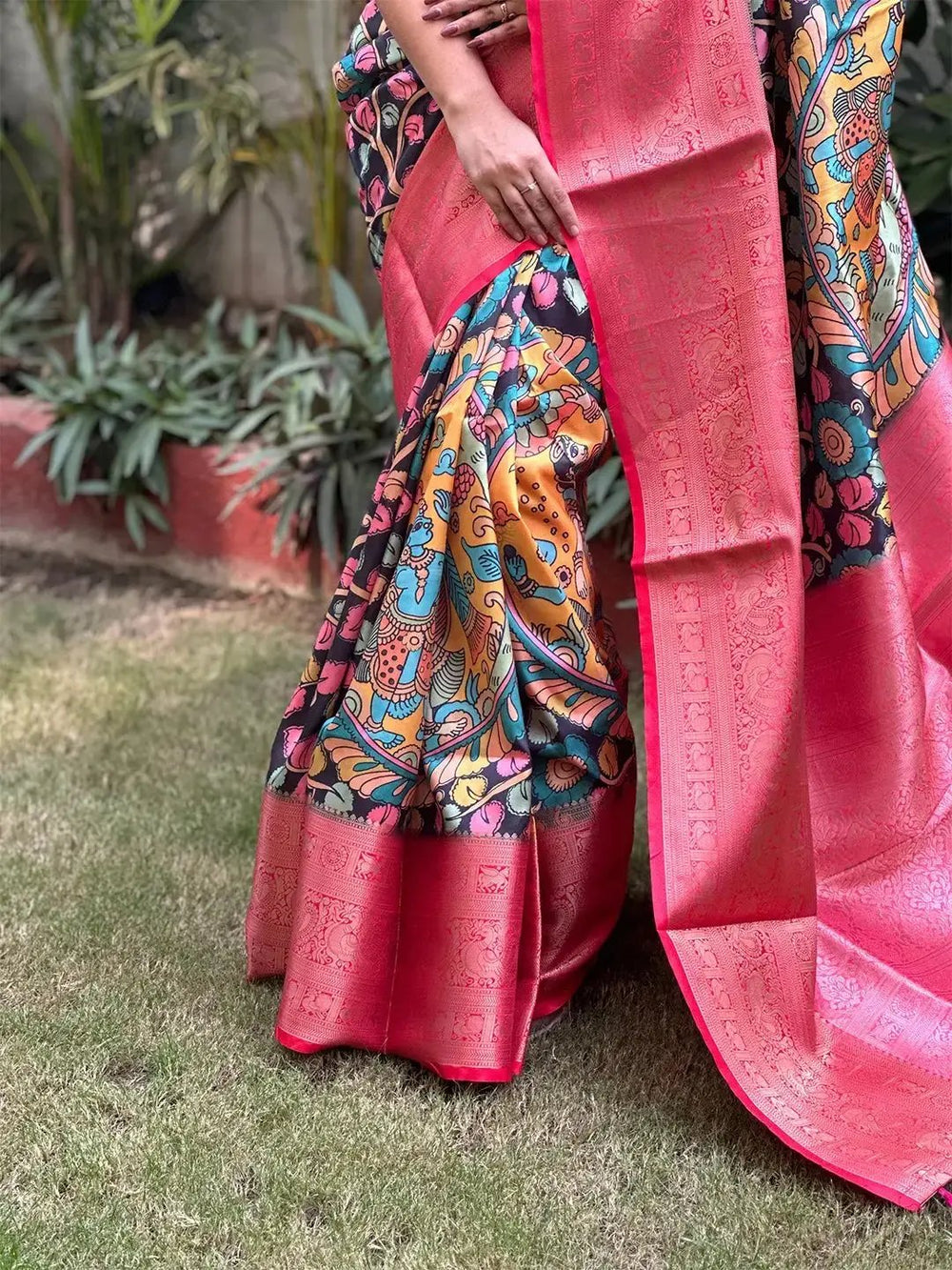 Close-up of Kalamkari digital print on soft silk saree