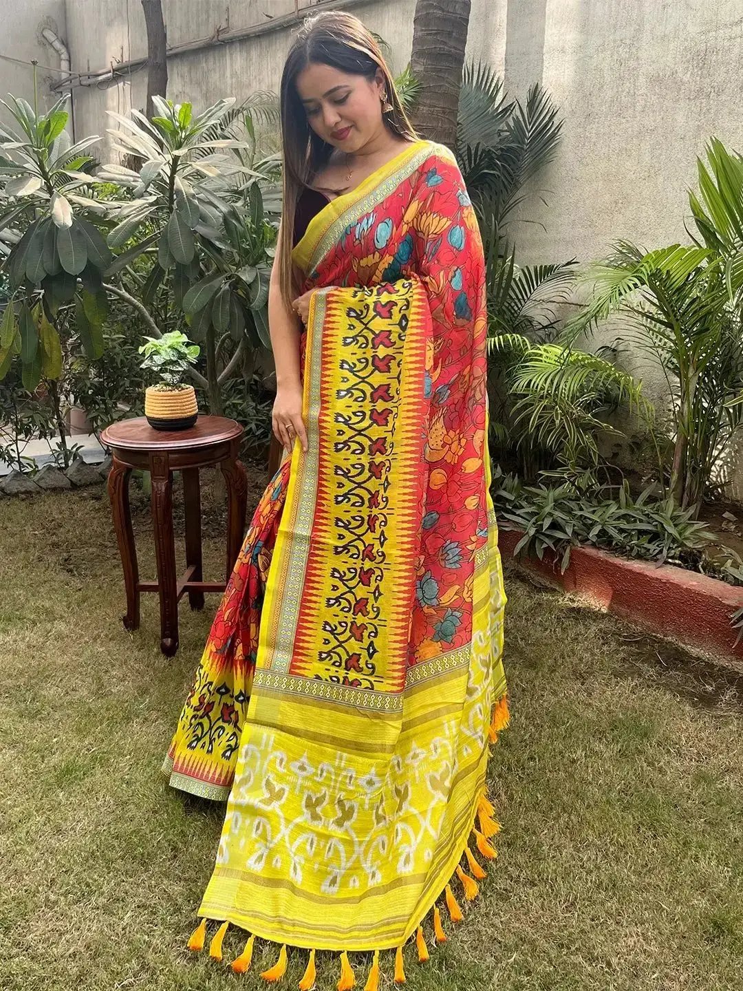 Colorful Kalamkari saree with intricate floral patterns