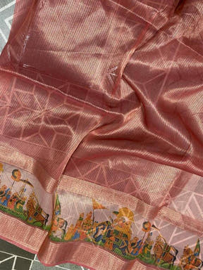 Close-up of Soft Gold Zari Tissue Saree with vibrant digital print.