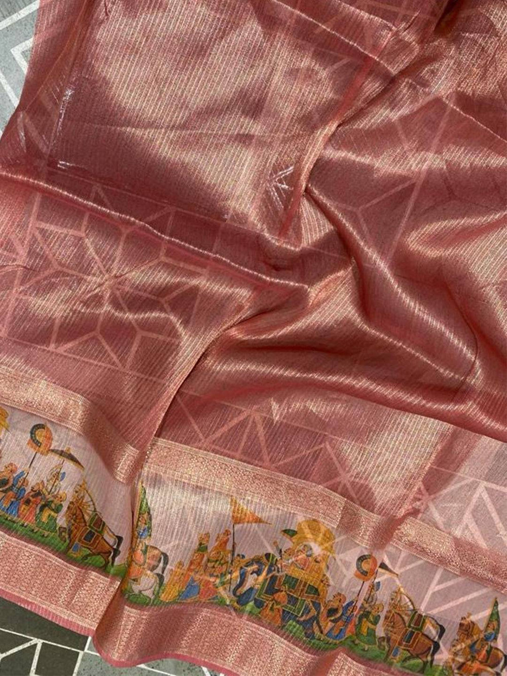 Close-up of Soft Gold Zari Tissue Saree with vibrant digital print.