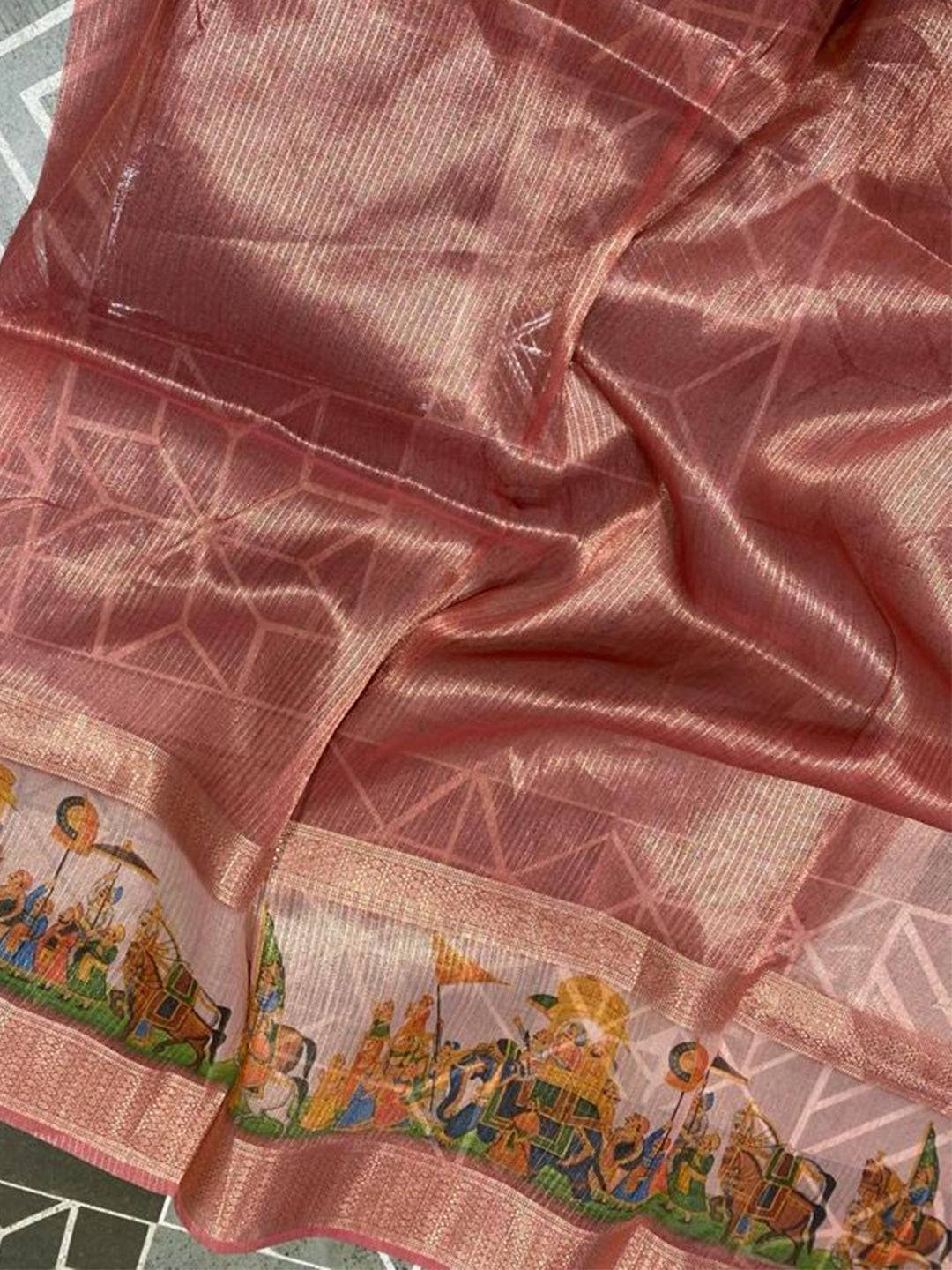 Close-up of Soft Gold Zari Tissue Saree with vibrant digital print.