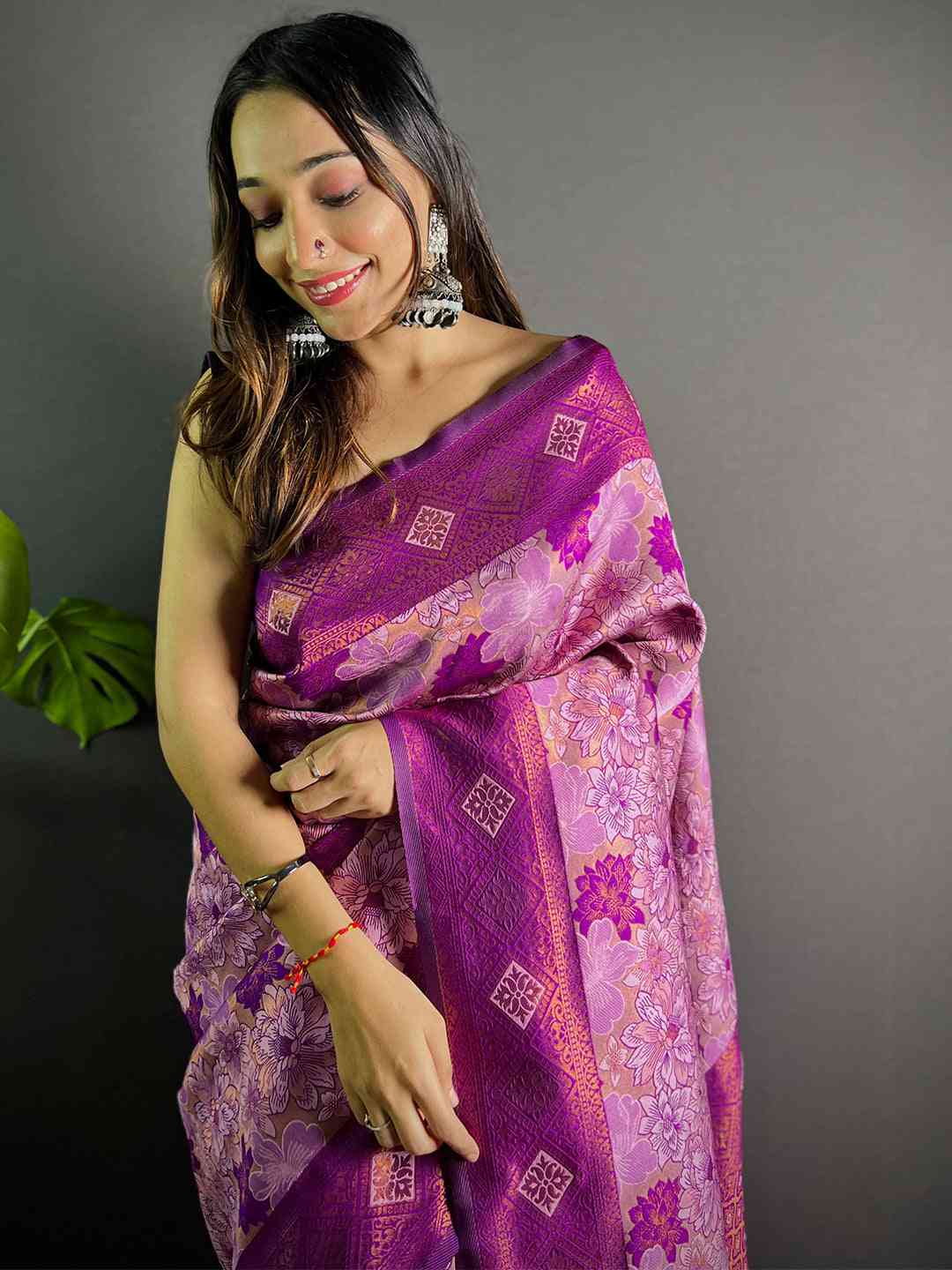 Model wearing lavender soft silk butta weaving saree