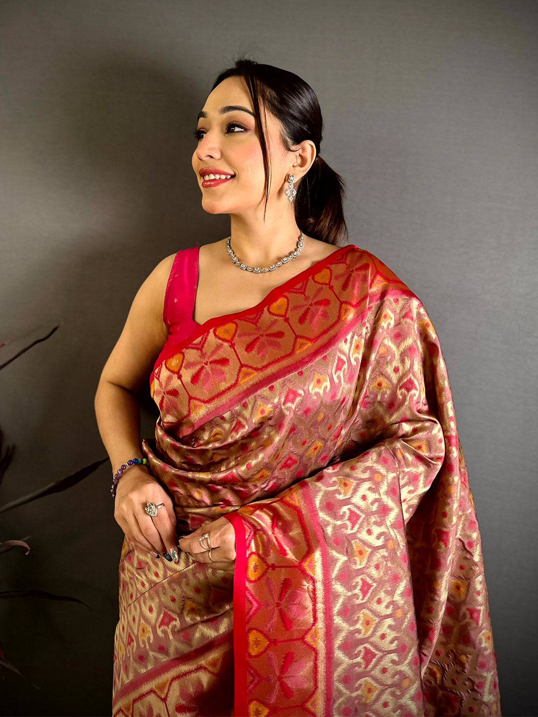 Radiant Peach Ikkat Soft Silk Saree