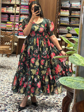 Revan Black Floral Print Midi Dress worn by model in store