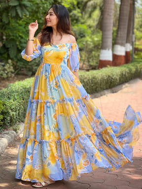 Masha Yellow Floral printed Dress flowing outdoors