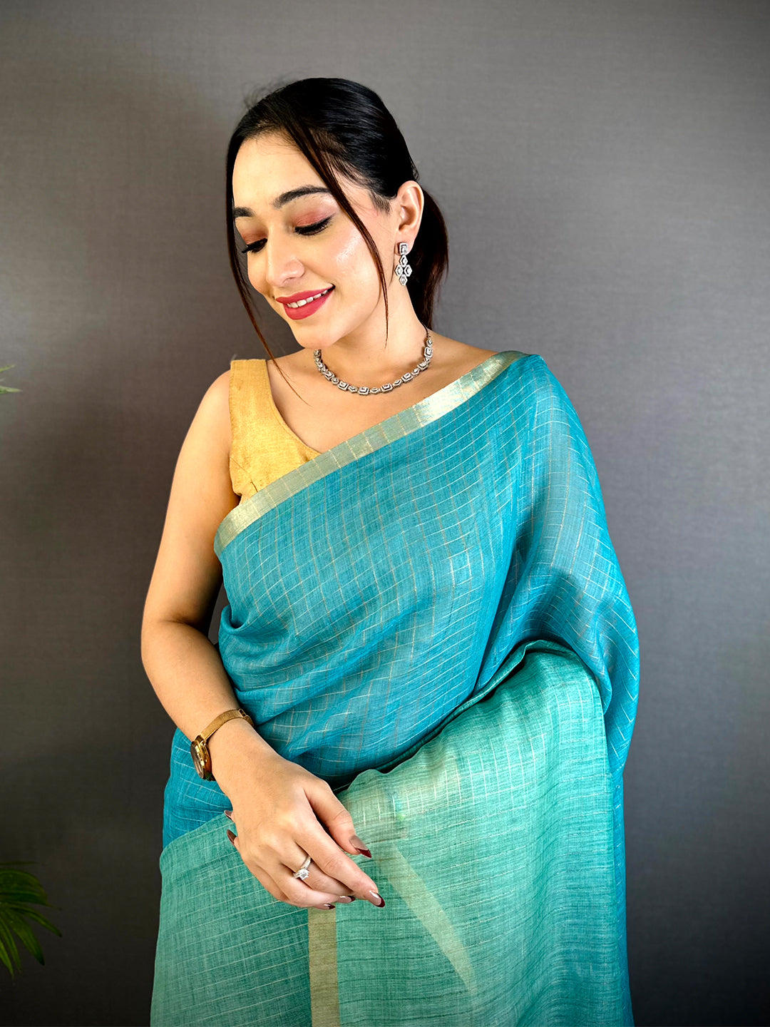 Regal Self Chex Linen Zari Saree
