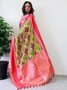 Elegant Pochampally print saree with vibrant Gadwal border.