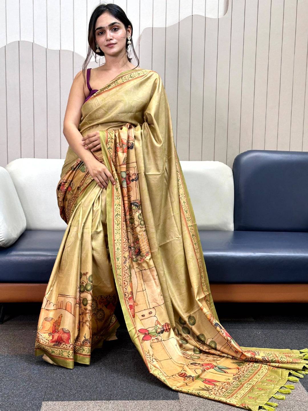 Elegant light green saree with free hand Kalamkari print