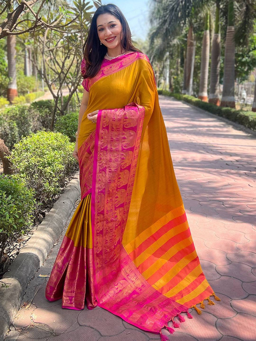 Elegant Mustard Kanjivaram Saree with Pink Brocade Design