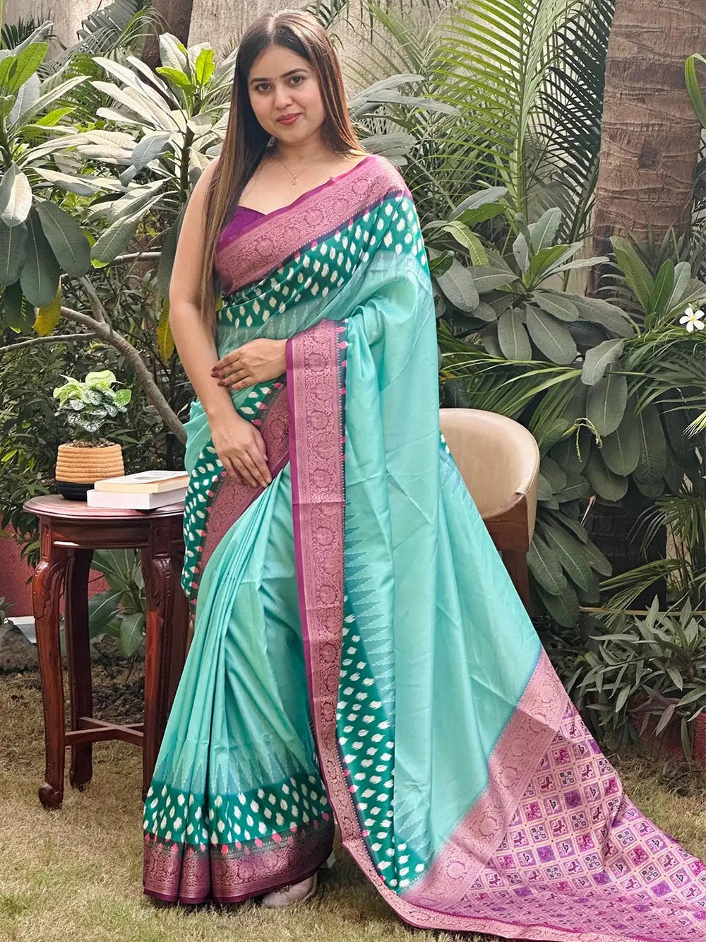 Stylish Banarasi soft silk saree featuring intricate Patola pallu.