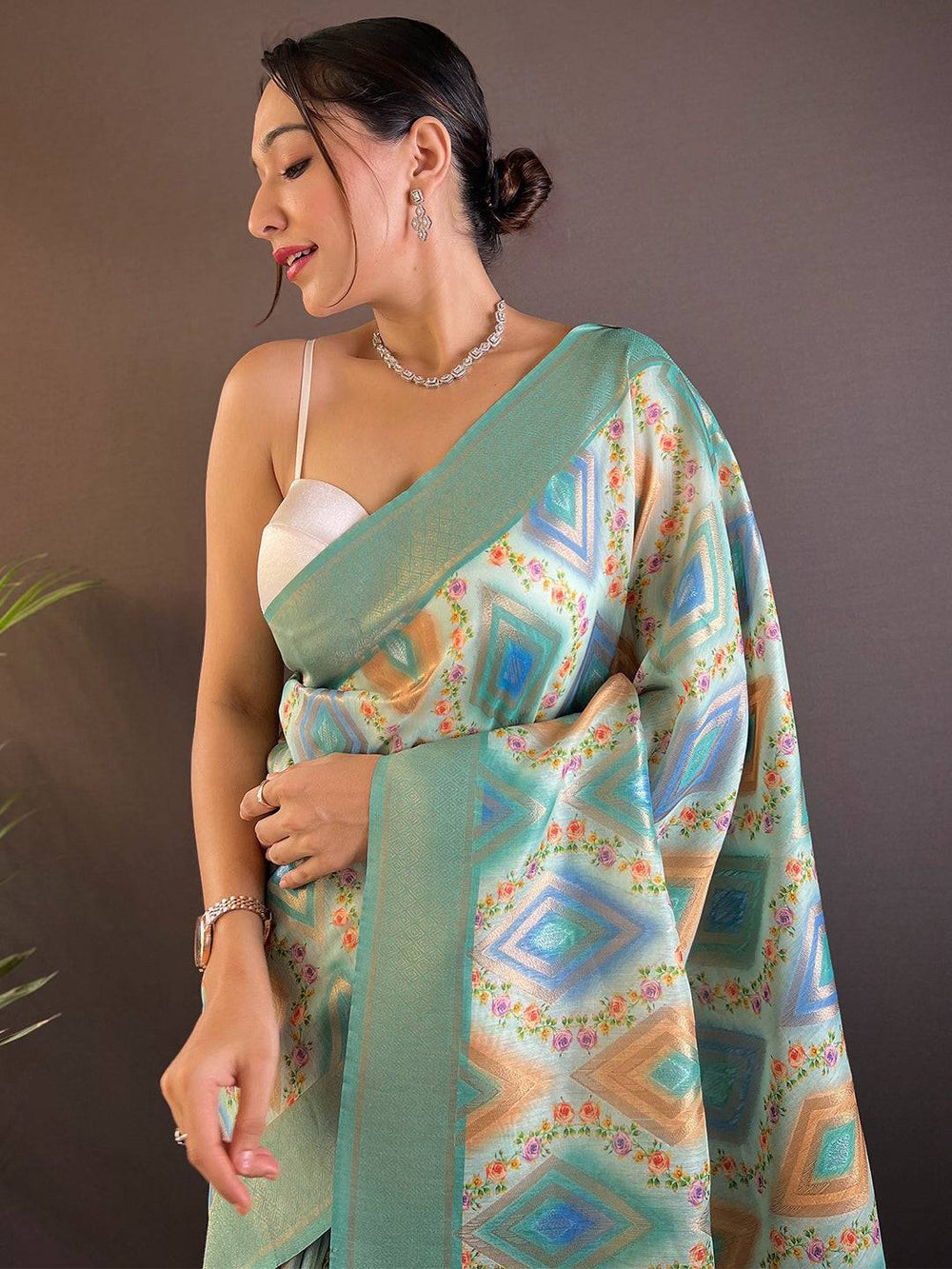 Mint green Banarasi saree with flower vely print