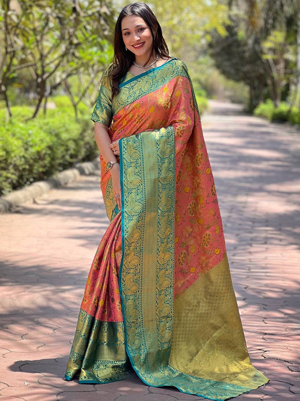 Elegant pink Banarasi saree with green border