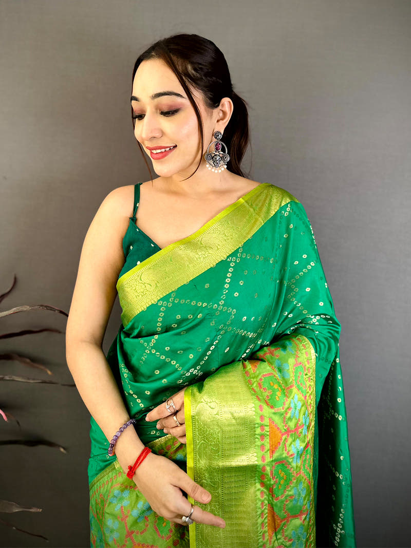 Green Katan Silk Ikkat Saree with intricate border and traditional design