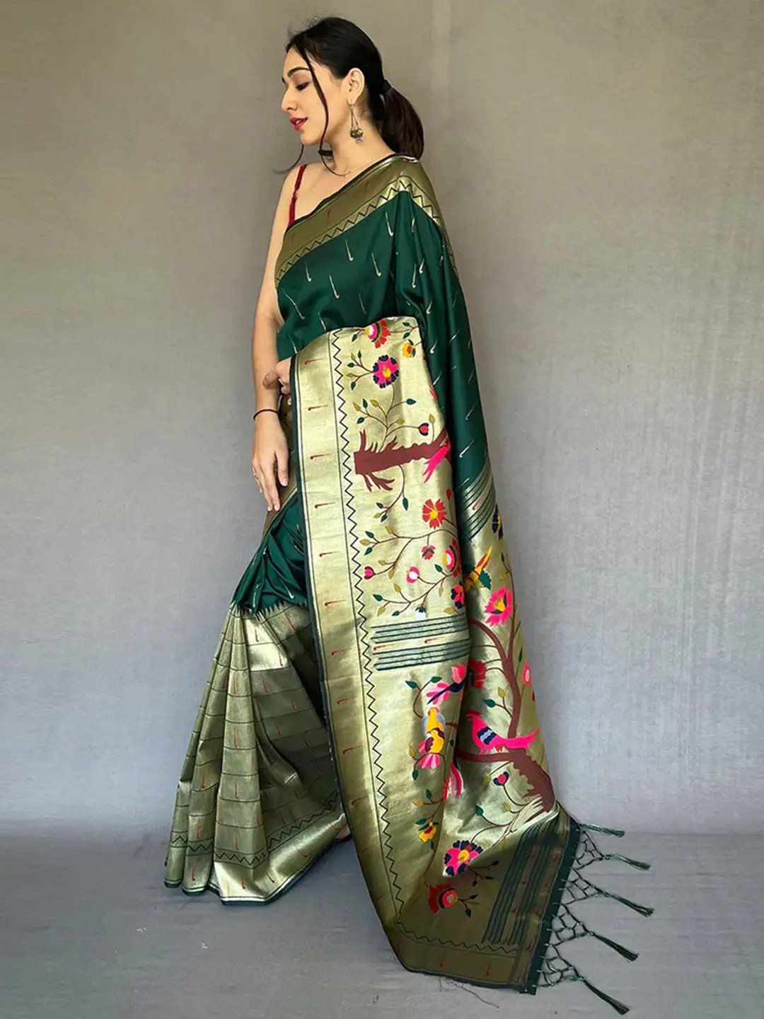 Side view of Bottle Green Paithani saree showcasing zari design